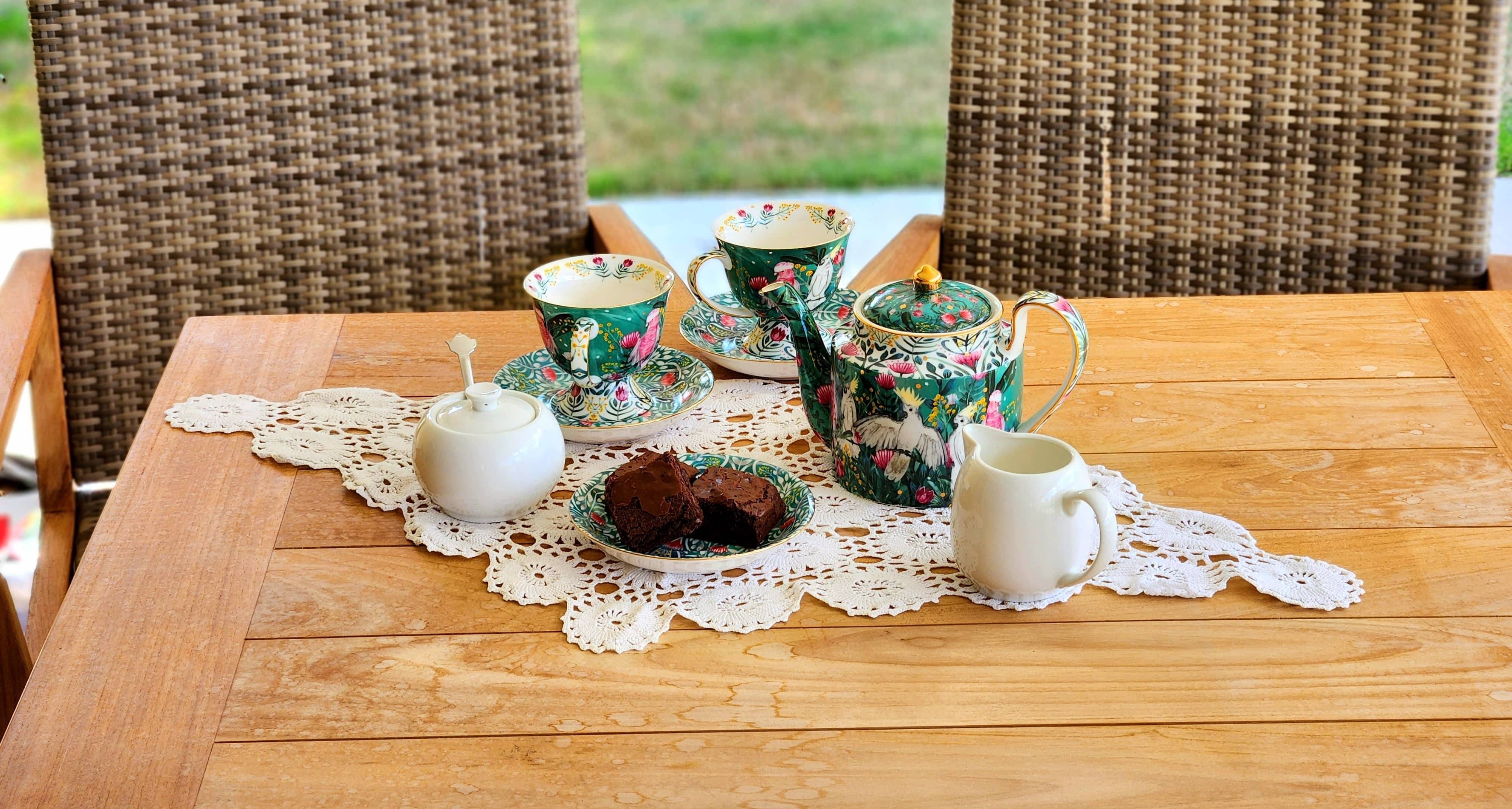 Calm Ordered Tea set taken outside on a wooden table